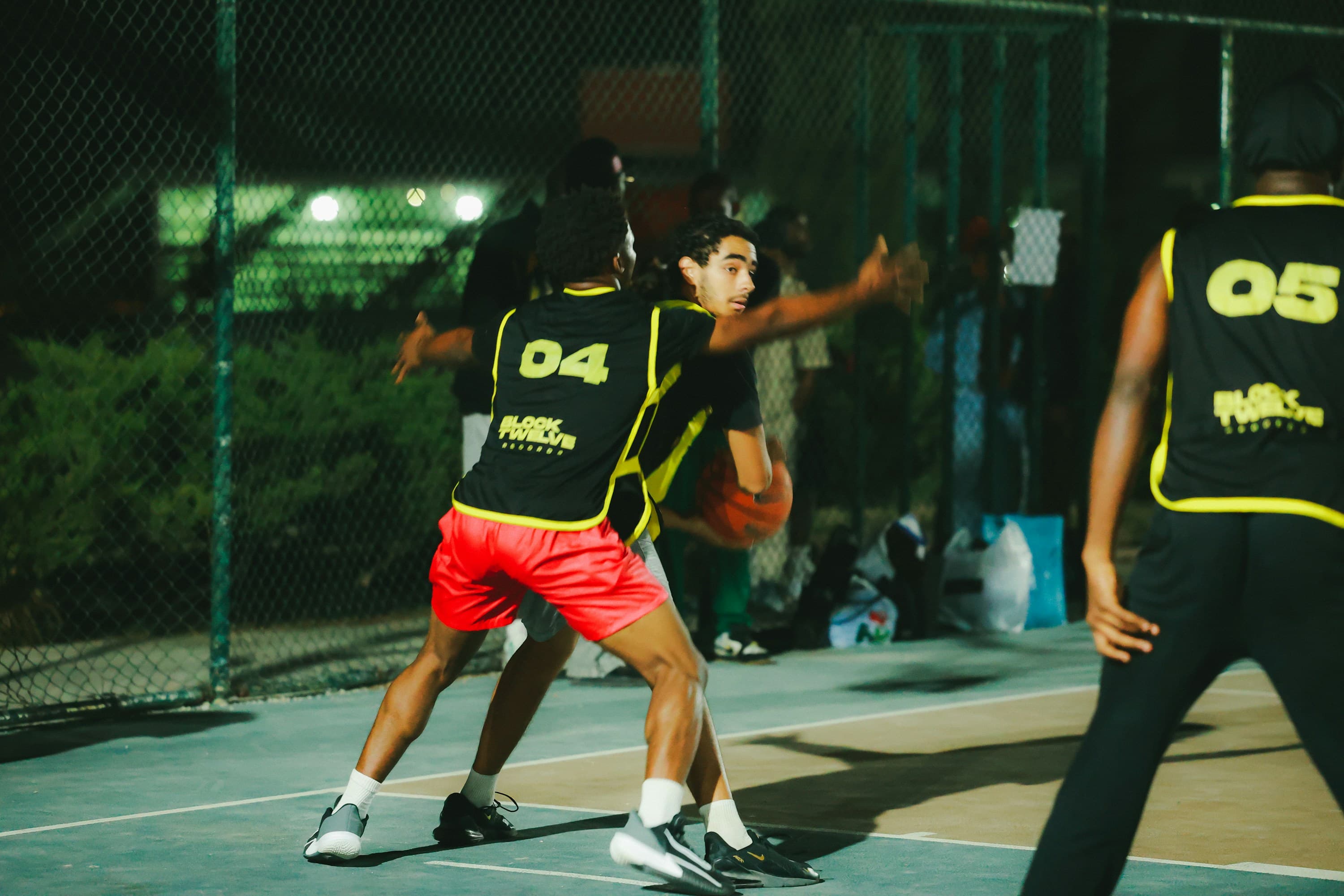 Competitive pickup basketball under the lights